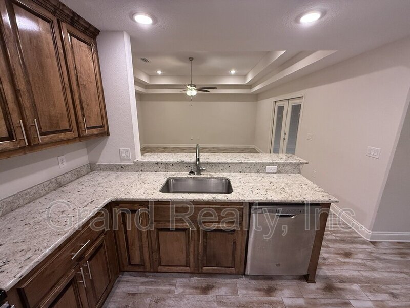 Beautiful 3-Bed Milton Retreat Featuring Granite Counters, Large Backyard, and a Screened In Porch! property image