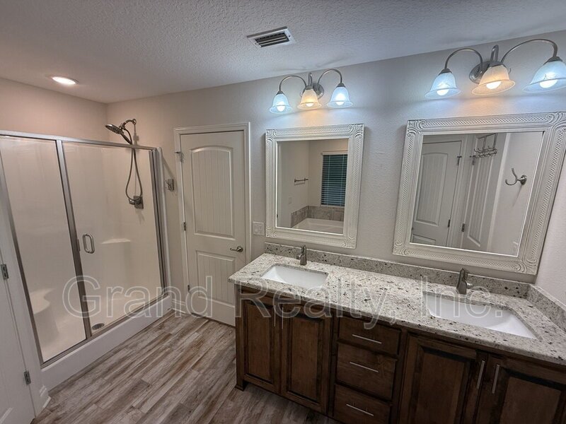 Beautiful 3-Bed Milton Retreat Featuring Granite Counters, Large Backyard, and a Screened In Porch! property image