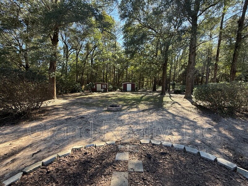 Inviting 3 Bedroom Home in the Heart of Pace with Granite Finishes and a Spacious Screened Porch! property image