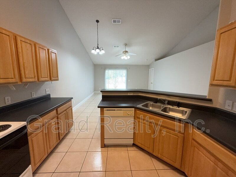 Cute 2-Bedroom, 2-Bath Duplex at 6901 Ella St, Bagdad, FL 32583 - Your Perfect Rental Home Awaits! *Lawncare included!* property image