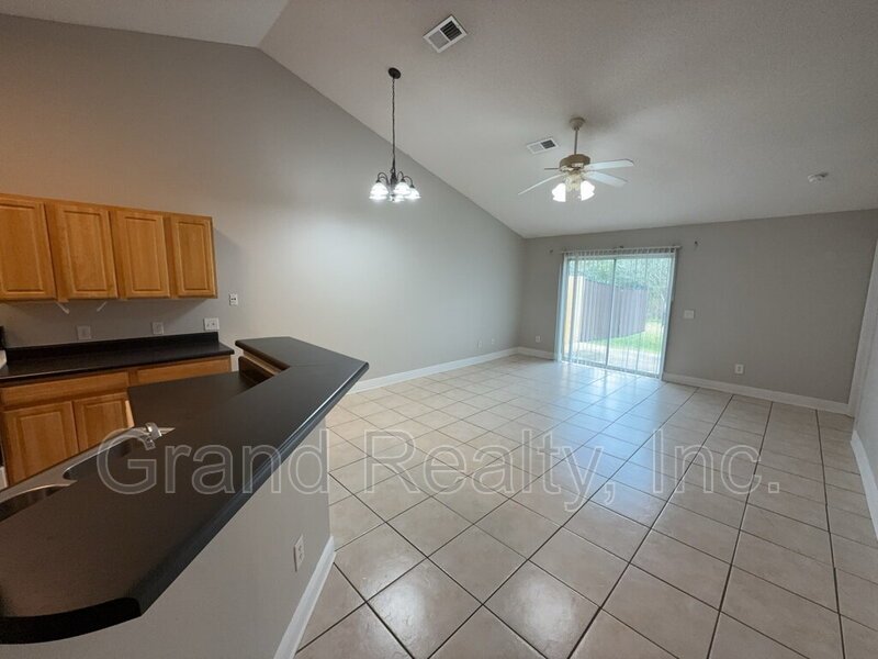 Cute 2-Bedroom, 2-Bath Duplex at 6901 Ella St, Bagdad, FL 32583 - Your Perfect Rental Home Awaits! *Lawncare included!* property image