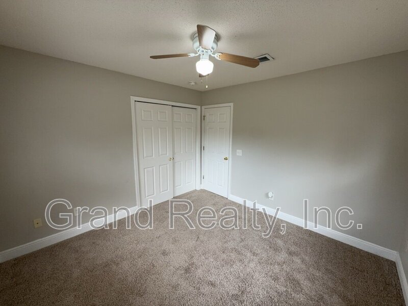 Cute 2-Bedroom, 2-Bath Duplex at 6901 Ella St, Bagdad, FL 32583 - Your Perfect Rental Home Awaits! *Lawncare included!* property image