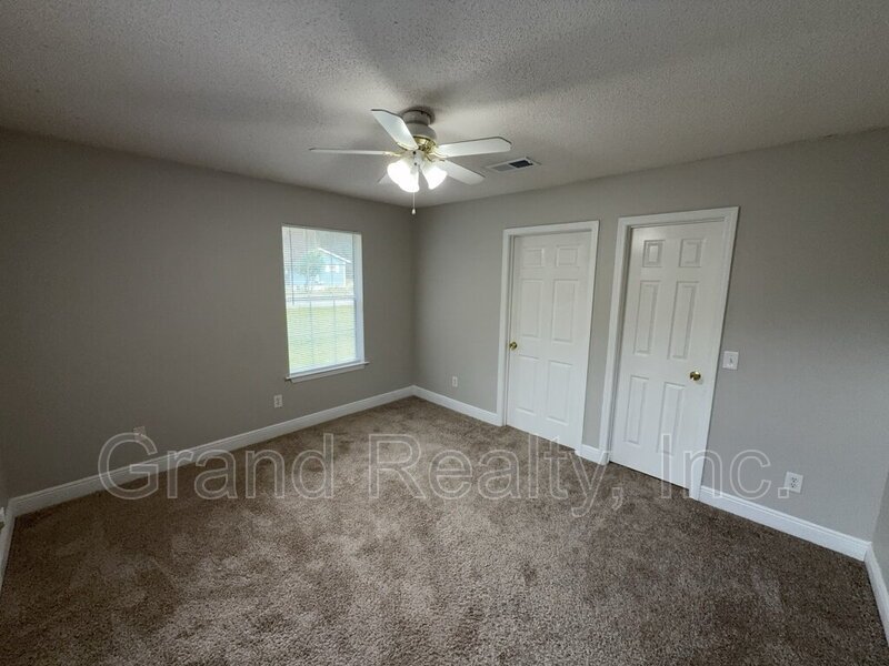 Cute 2-Bedroom, 2-Bath Duplex at 6901 Ella St, Bagdad, FL 32583 - Your Perfect Rental Home Awaits! *Lawncare included!* property image