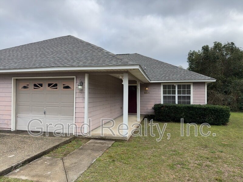 Cute 2-Bedroom, 2-Bath Duplex at 6901 Ella St, Bagdad, FL 32583 - Your Perfect Rental Home Awaits! *Lawncare included!* property image