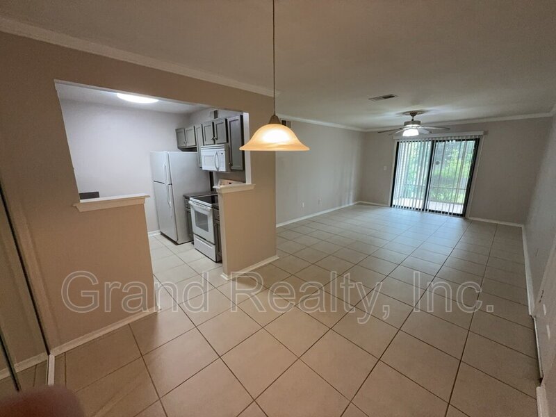 Move-In Ready 2 Bed, 2 Bath Condo with Screened Porch on West Michigan Avenue! property image
