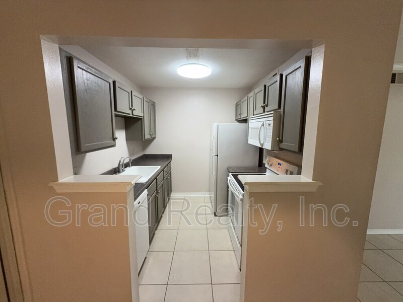 Move-In Ready 2 Bed, 2 Bath Condo with Screened Porch on West Michigan Avenue! property image