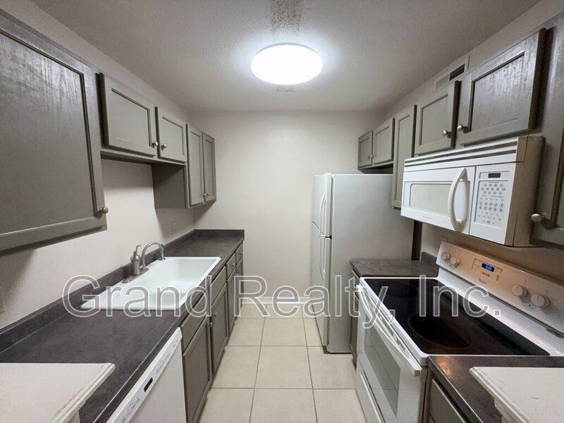 Move-In Ready 2 Bed, 2 Bath Condo with Screened Porch on West Michigan Avenue! property image