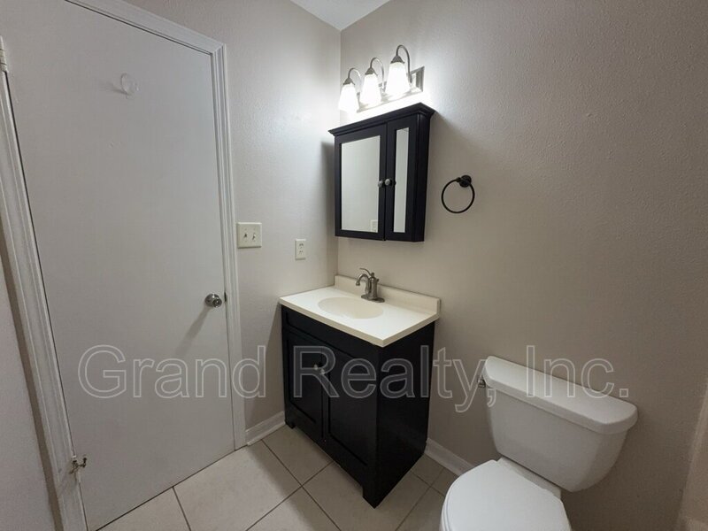 Move-In Ready 2 Bed, 2 Bath Condo with Screened Porch on West Michigan Avenue! property image