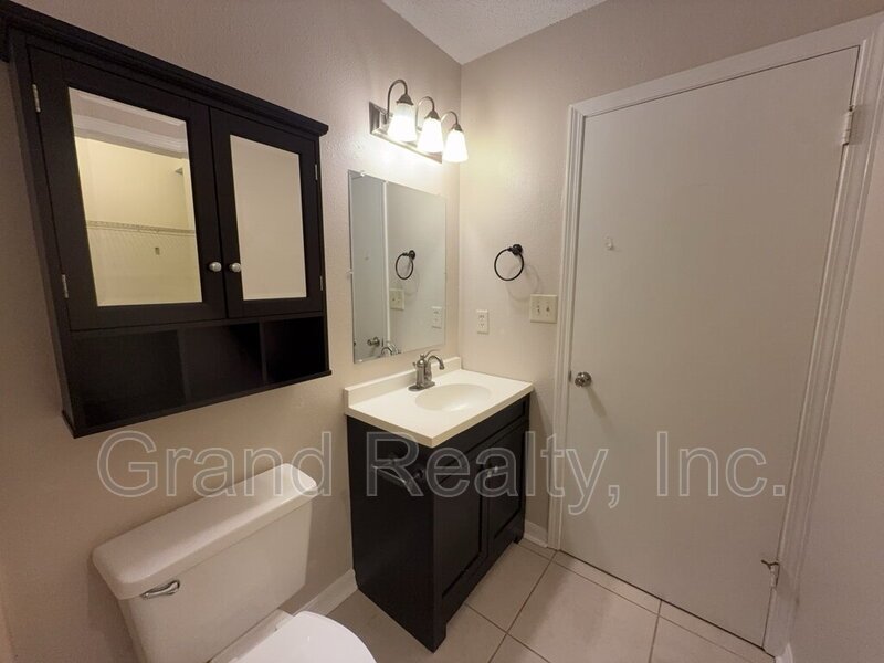Move-In Ready 2 Bed, 2 Bath Condo with Screened Porch on West Michigan Avenue! property image